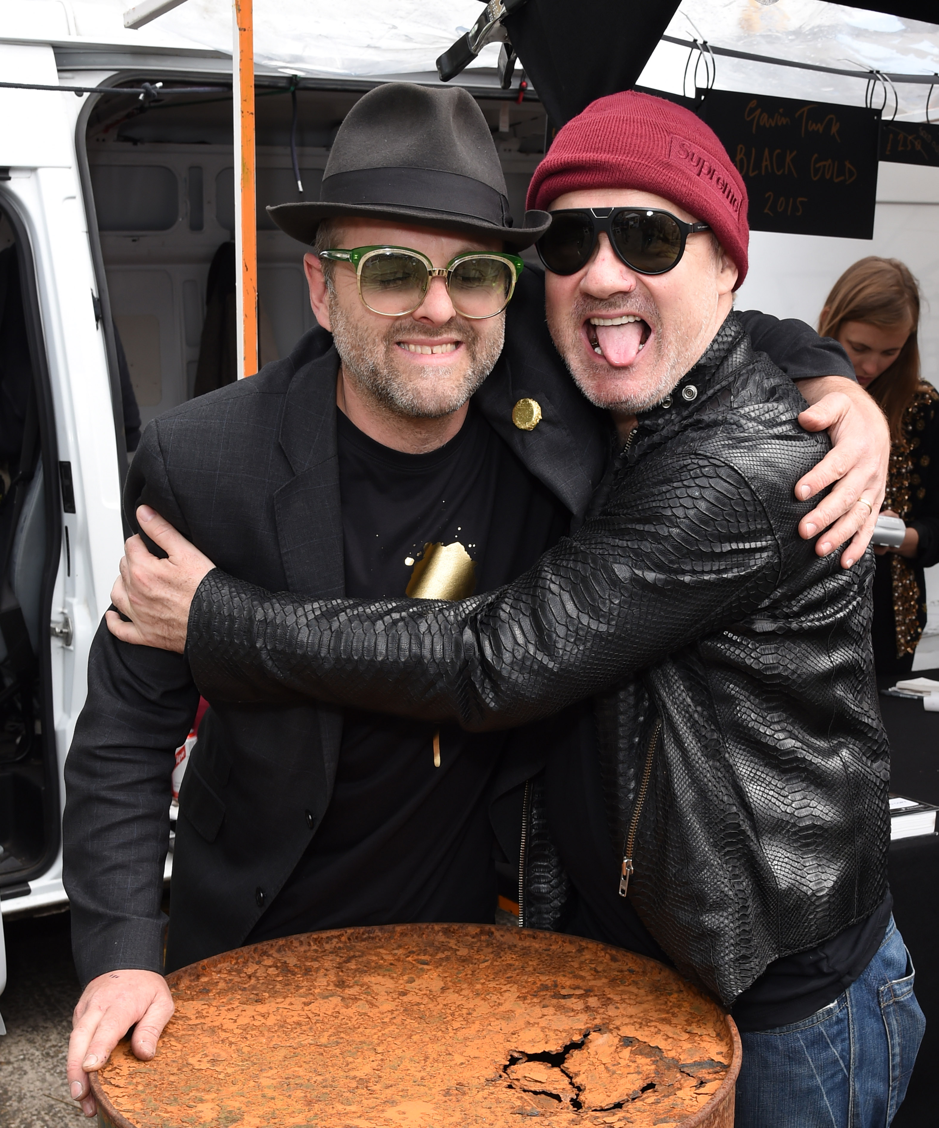 Gavin Turk (Left) and Damien Hirst at the Vauxhall Art Car Boot Fair 2015 on Sunday 14th June 2015 Photo by Dave Benett
