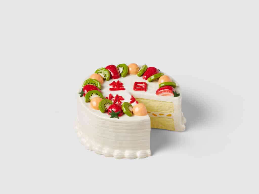 Stephanie H. Shih, Birthday Cake, 2022. Ceramic, 4 ½ x 9 ½ x 9 ½ in. Credit: Robert Bredvad