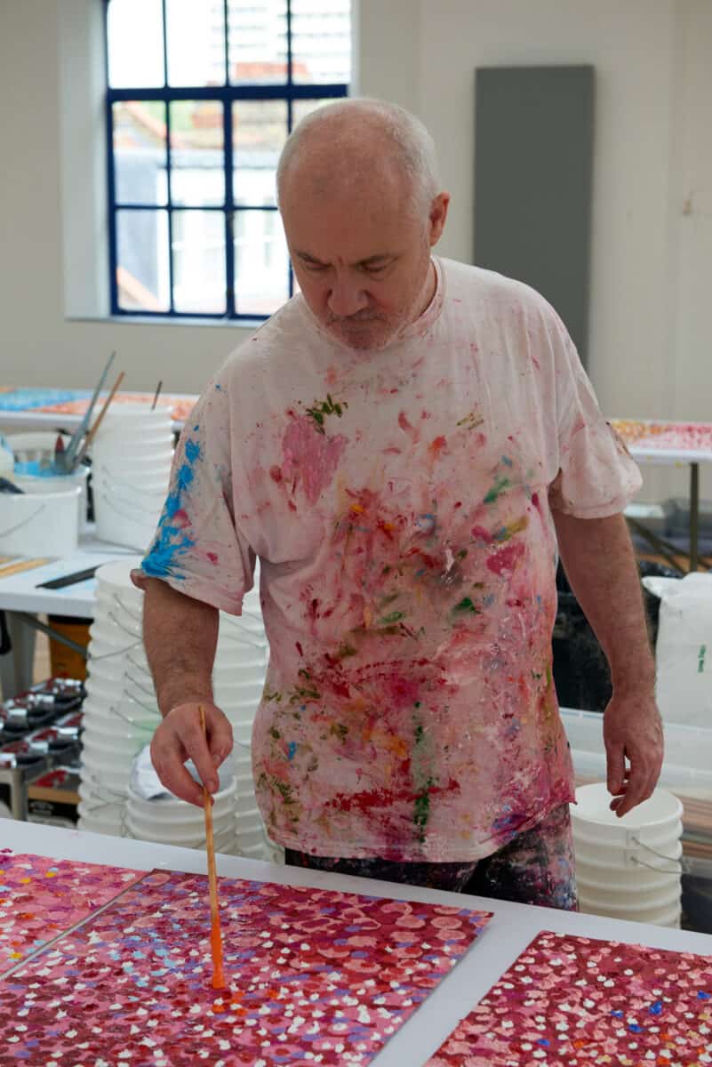 Damien Hirst in studio, 2019. Photographed by Prudence Cuming Associates Ltd © Damien Hirst and Science Ltd. All rights reserved, DACS 2022.