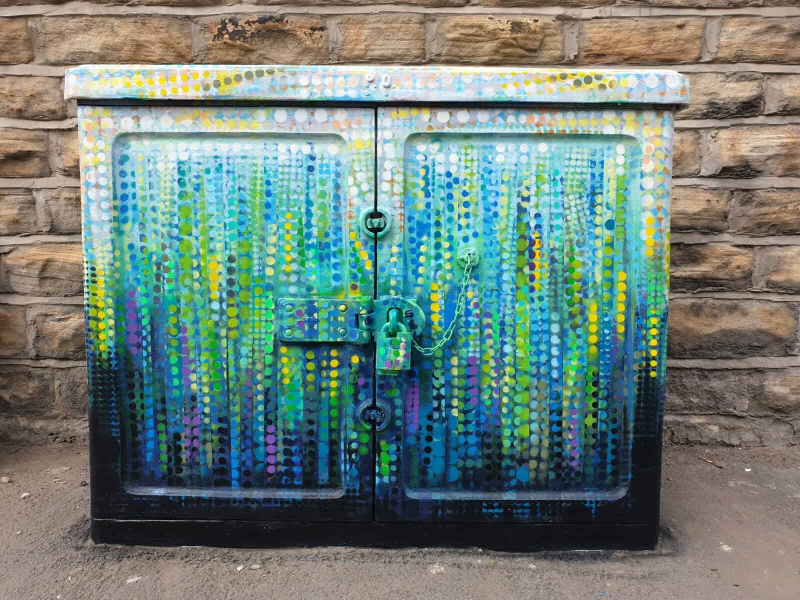 Kelham Weir - telecoms box painted by Kieran Flynn