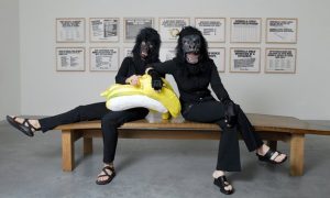 Two of the Guerrilla Girls pose at a Tate Modern exhibition in 2006. Members of the group wear gorilla masks in public to hide their identities. Photograph: Christian Sinibaldi