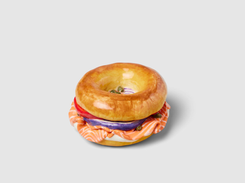 Stephanie H. Shih, Bagel and Lox, 2022. Ceramic, 2 ½ x 5 ¼ x 4 ½ in. Credit: Robert Bredvad