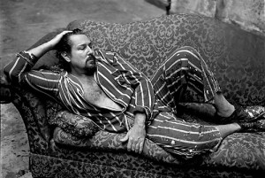 Julian Schnabel in his trademark paint-splattered silk pajamas