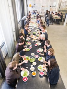 Olafur Eliasson (top of table) eating with staff at The Kitchen in his Berlin studio. Photograph: Thorsten Futh for the Guardian