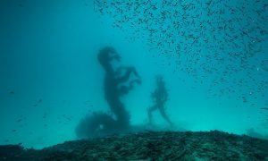 Into the deep... a new image of a Damien Hirst work, Treasures from the Wreck of the Unbelievable. Photograph: Christoph Gerigk/© Damien Hirst and Science Ltd