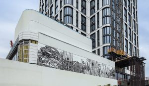 Artist Swoon creates gigantic mural on 23-story, terra-cotta and glass tower The Dime