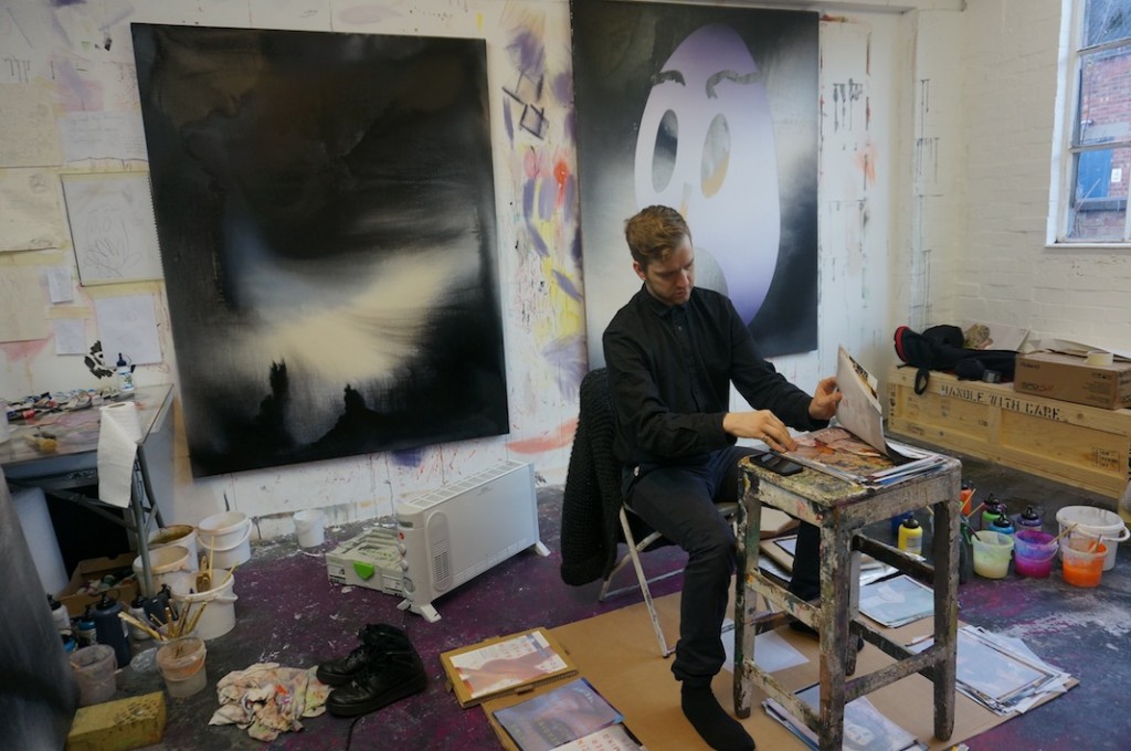 7 Eddie Peake in his studio selecting the prints that will make the final cut of 100