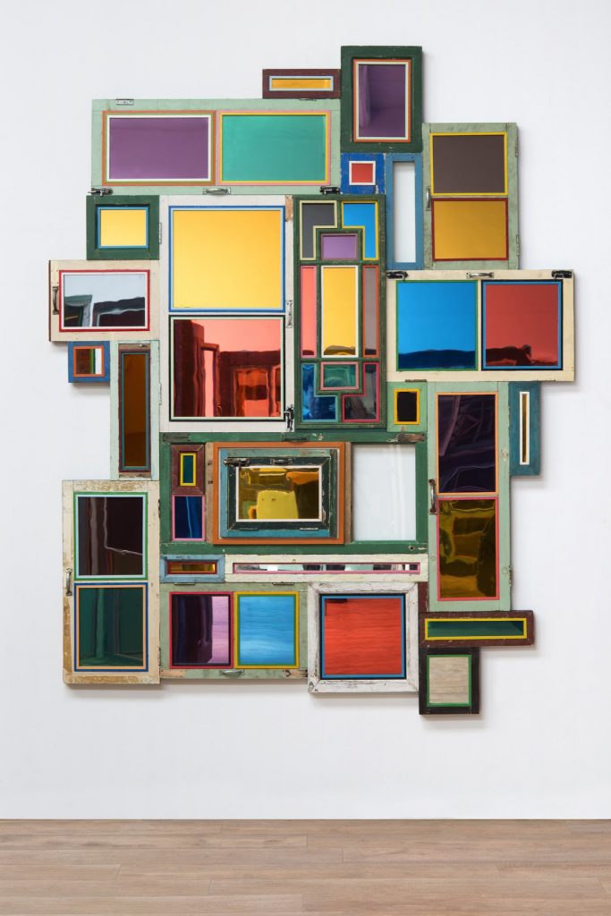 Song Dong, Usefulness of Uselessness - Varied Window No. 12, 2018-2019, old wooden windows, mirror, mirror panel, glass, 188 cm × 240 cm × 8 cm (74" × 94-1/2" × 3-1/8") © Song Dong 66221.02.jpeg Song Dong, Eating the City - Vienna 02, 2007, color photograph, 90 cm x 60 cm (35-7/16" x 23-5/8"), Edition of 5 + 2 APs © Song Dong