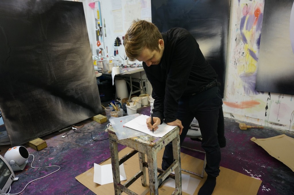 9 - Eddie signing the edition certificates in his studio