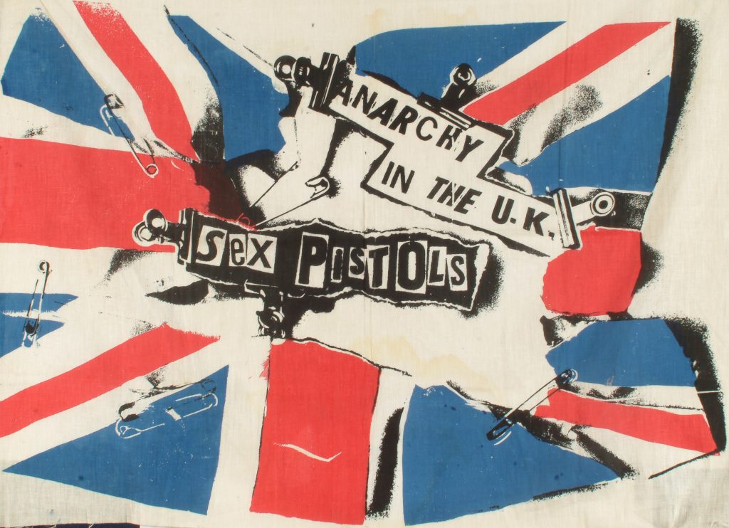 Jamie Reid, Anarchy In The UK, 1976. Screen print on muslin, 690mm x 900mm approx. Private Collection.