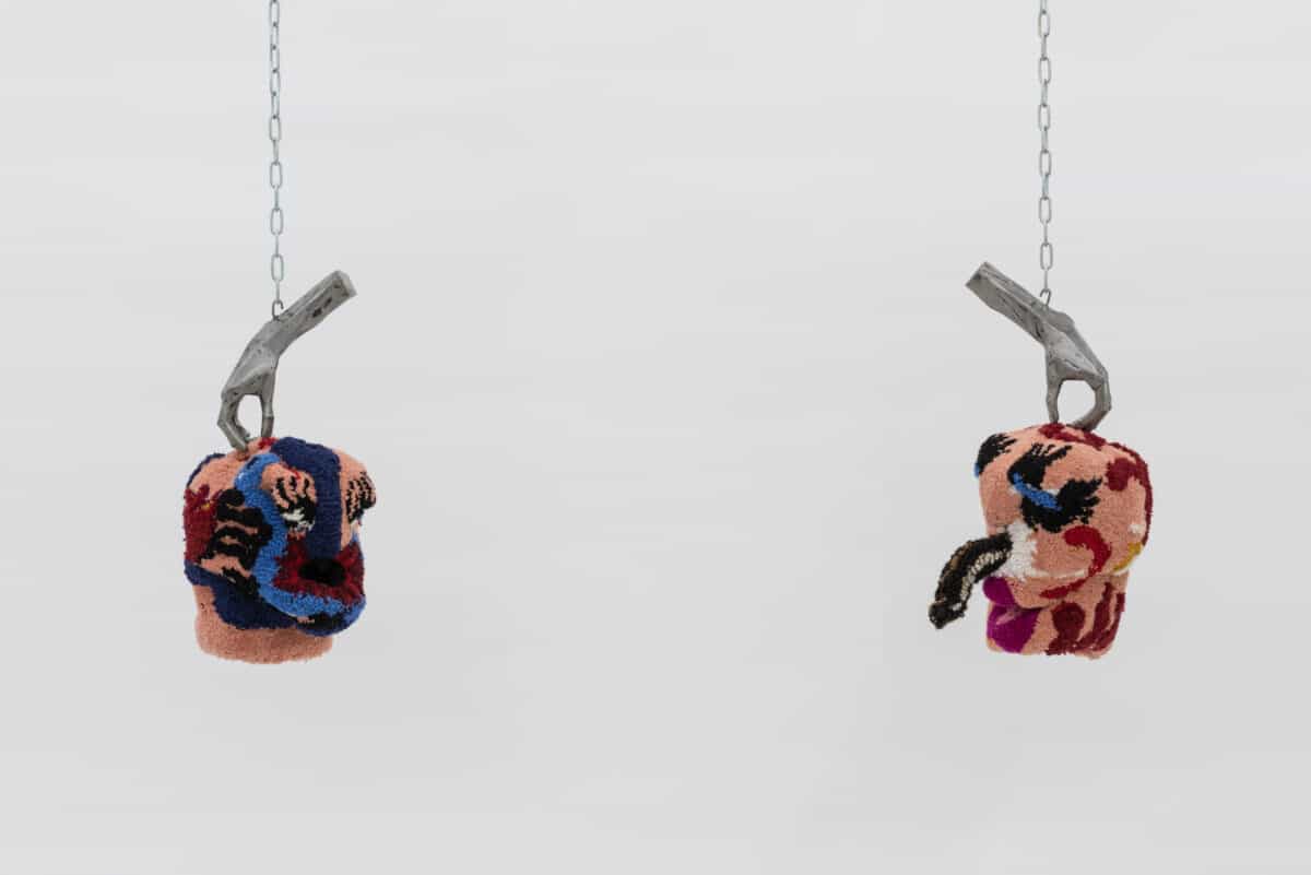 Anna Perach, Pain, Axminster yarn, steel, chain, fabric, 70 x 30 x 45 cm (left) and Anna Perach, Chocked, Axminster yarn, steel, chain, fabric, 70 x 30 x 45 cm (right)