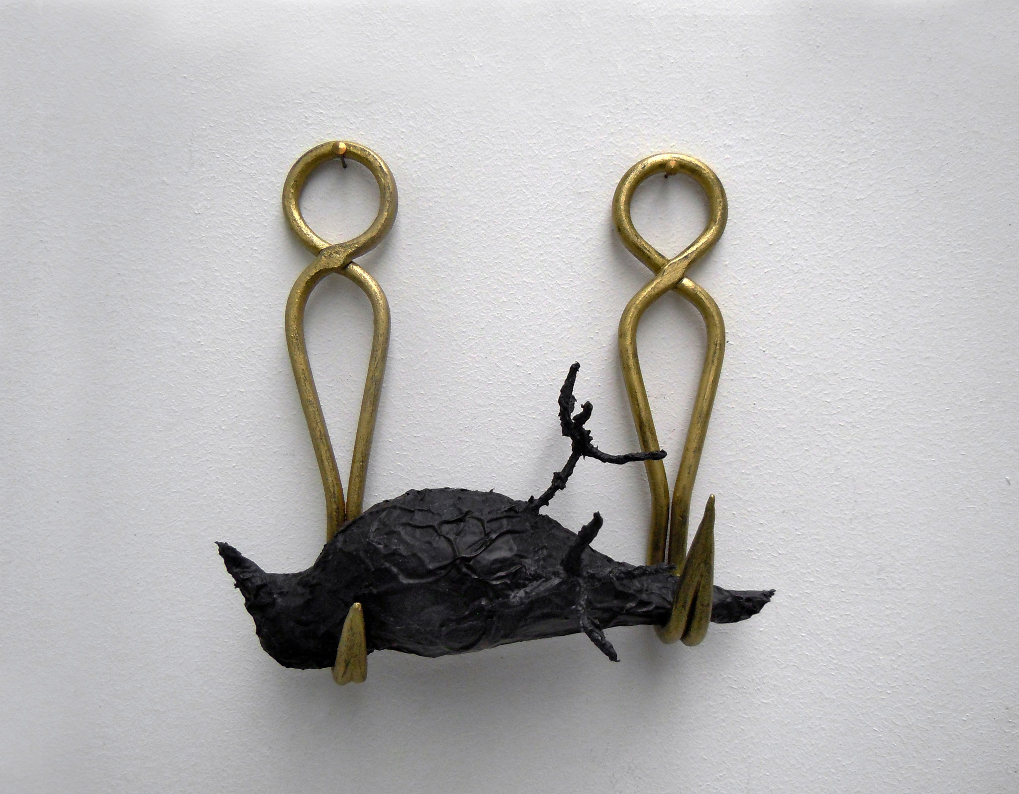 Annette Messager L'oiseau, 2015 Black aluminium foil, 2 painted hooks