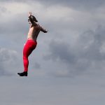 Joel Hicks with his themed Battle for the Skies, leaps off Worthing Pier in west Sussex, as competitors take part in the annual Worthing International Birdman competition.