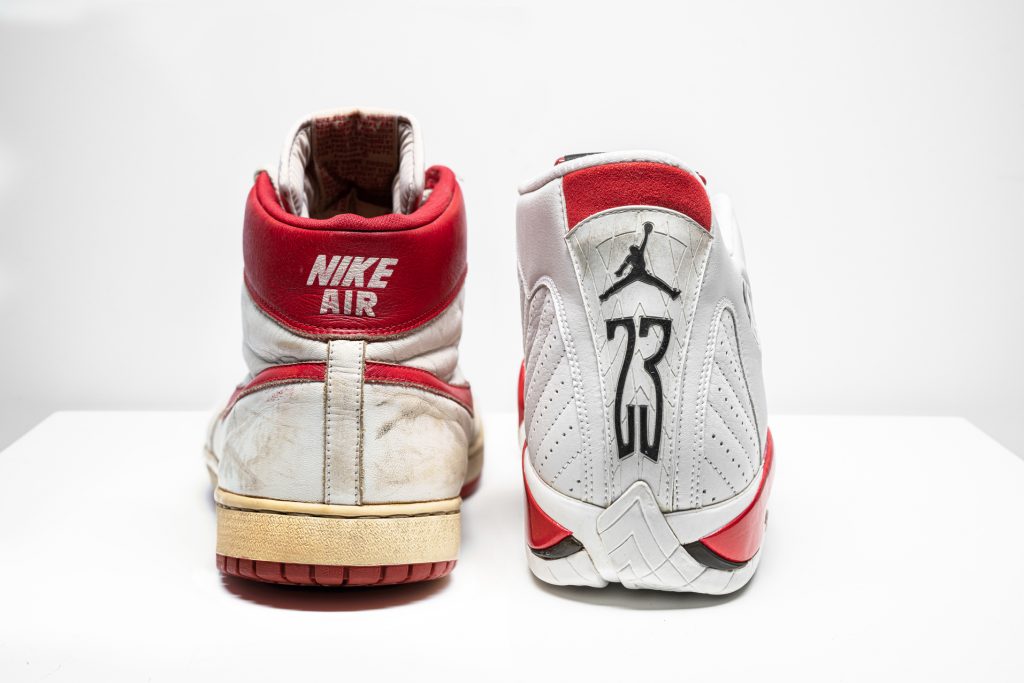 IR SHIP, MJ PLAYER EXCLUSIVE, GAME-WORN SNEAKERS, NIKE, 1984 LEFT SHOE: SIZE 13.5, RIGHT SHOE: SIZE 13, HIGH-TOP ESTIMATE $350,000 – 550,000 AIR JORDAN 14 “CHICAGO”, PLAYER EXCLUSIVE, PRACTICE-WORN SNEAKERS, NIKE, 1998 SIZE 13, MID-TOP ESTIMATE $6,000 – 8,000