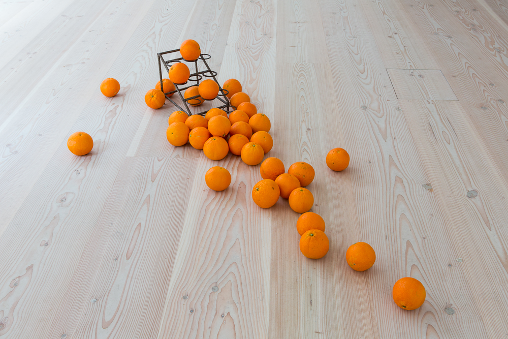 Delfina Foundation Senam Okudzeto (Ghana/UK/USA), PORTE-ORANGES (CM), 2012 / PORTE-ORANGES (detail), 2004-2007 Metal sculptures, oranges, video, sound. Duration: 6.32 min Photo © Tim Bowditch