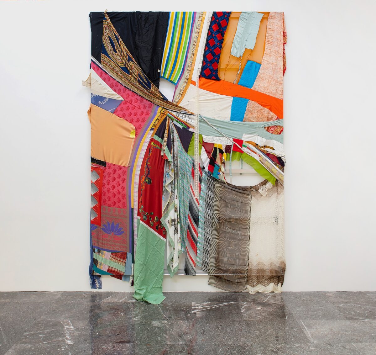 ERIC N. MACKThere Is No Other Way, 2022Silk and wool scarves, cotton apron, Irish linen, rope, ribbon, polyester, felt, cotton shirt, and wool128 x 88 inches (325.1 x 223.5 cm)© Eric N. MackPhoto: WhiteBalanceMXCourtesy of the artist, Morán Morán and Gagosian