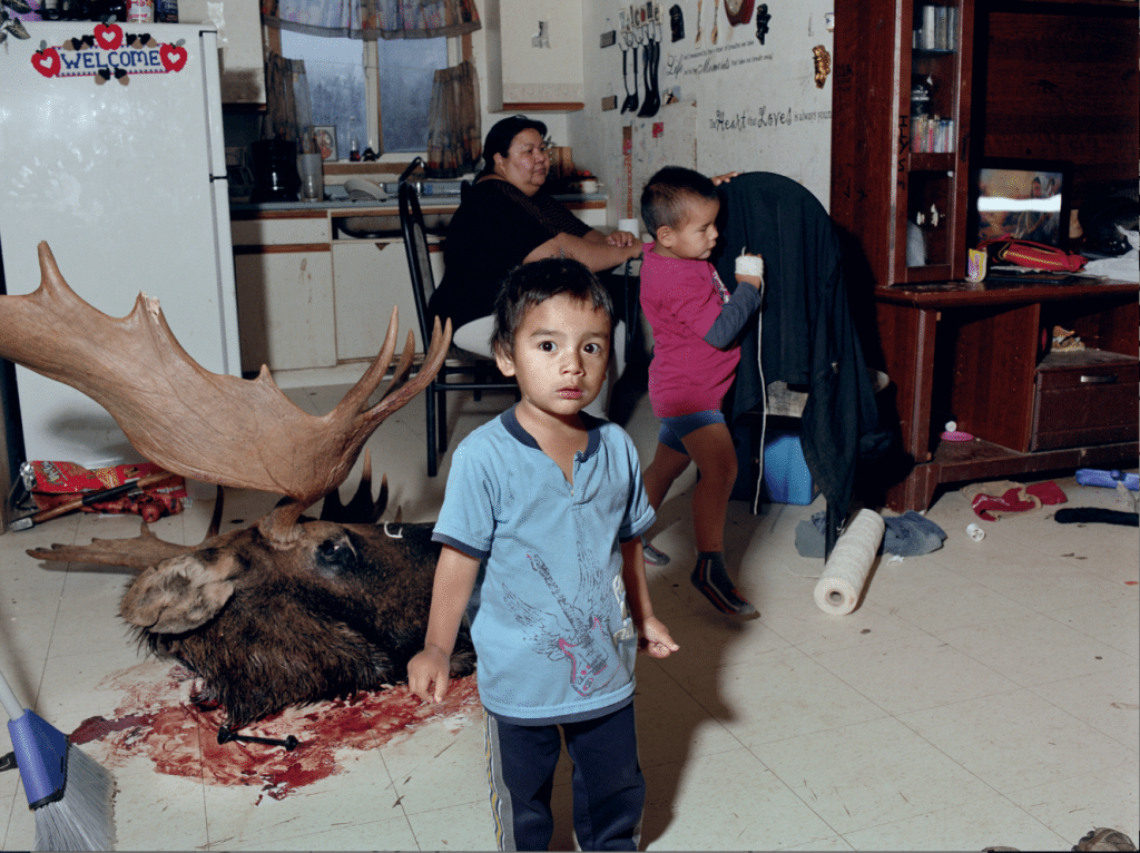 Family in Shamattawa Aboriginal Reserve, Manitoba, Canada, 2, 2012 courtesy Mark Neville