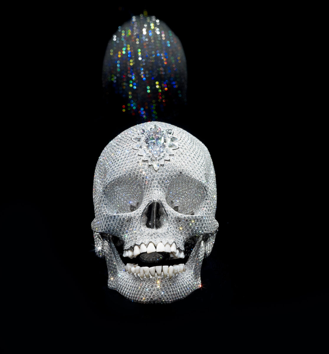 Damien Hirst , For the Love of God, 2007 Platinum, diamonds and human teeth 6.7 x 5 x 7.5 in (171 x 127 x 190 mm) Photographed by Prudence Cuming Associates L td. © Damien Hirst and Science Ltd. All rights reserved, DACS/Artimage 2023