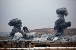 Kobane, Syria, 2014. Smoke columns from a coalition airstrike on an ISIS target over the besieged city. © Frédéric Lafargue.