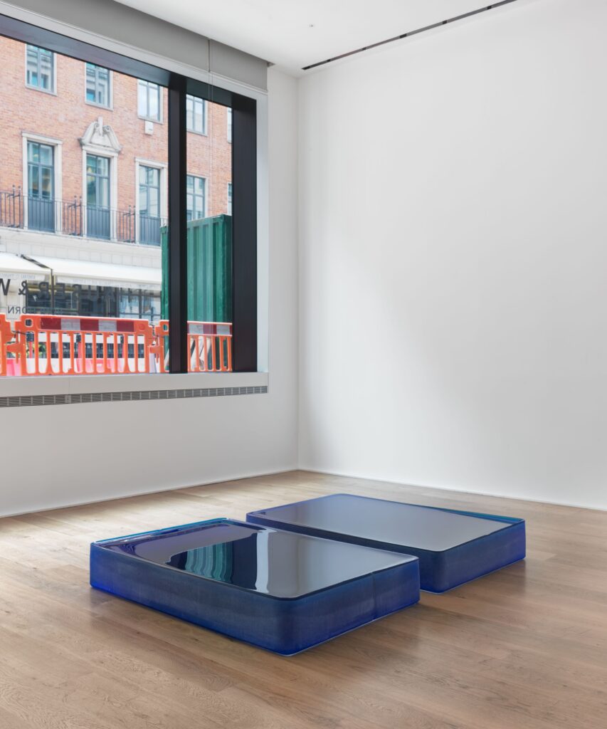 Roni Horn Blue by Blue (D) 2007 Solid cast blue glass with as - cast surfaces on all sides (fire - polished top), 2 units 24 x 101 x 151.5 cm / 9 1/2 x 39 3/4 x 59 5/8 in © Roni Horn Courtesy the artist and Hauser & Wirth Photo: Alex Delfanne