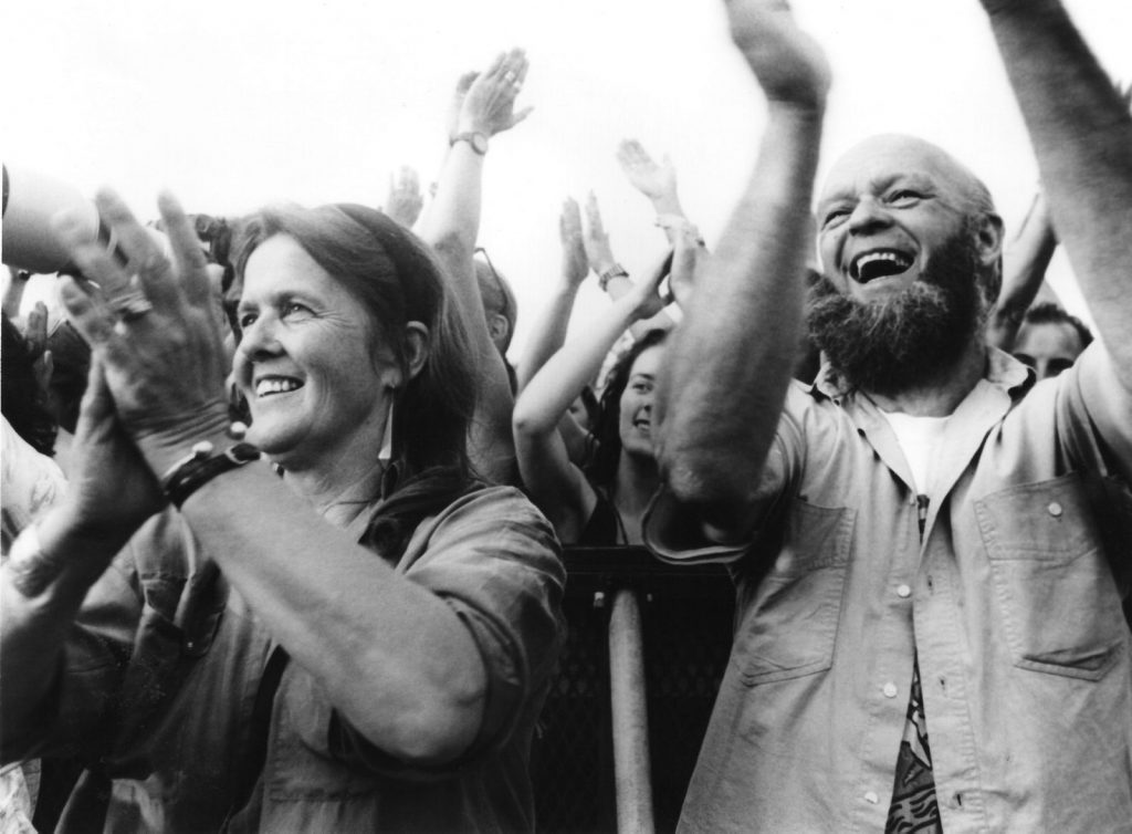 Jean and Michael Eavis cheer from the Pyramid Stage, 1992. © Brian Walker