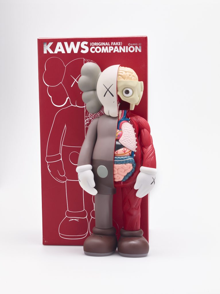 KAWS b. 1974 DISSECTED COMPANION (BROWN) painted vinyl, with original Medicom packaging 37.5 x 16.5 x 8.9 cm (14 3/4 x 6 1/2 x 3 1/2 in.) Executed in 2006, this work is from an edition of 500, fabricated by Medicom Toy and OriginalFake, Japan.