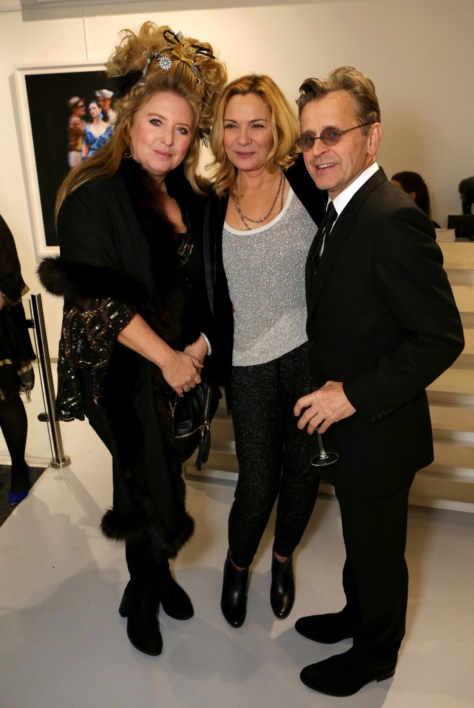 LONDON, ENGLAND - NOVEMBER 27: Artist Mikhail Baryshnikov (R) and actress Kim Cattrall (C) attend Dancing Away, photographic exhibition by Mikhail Baryshnikov at ContiniArtUK, co hosted by Damiani on November 27, 2014 in London, England .