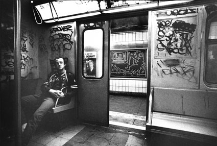 Tseng Kwong Chi Keith Haring in subway car, (New York), circa 1983. Photo © Muna Tseng Dance Projects, Inc. Art © Keith Haring Foundation