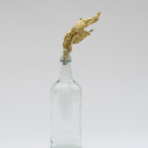 Gavin Turk Fire Water Gold foil, glass bottle and shelf 36.2cm x 9.8cm x 7.7cm 2019