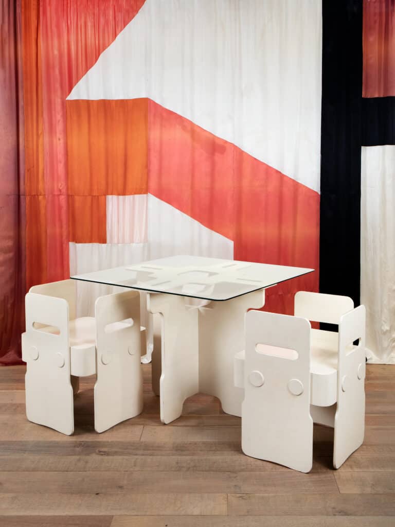 Max Clendinning, ‘Saturn’ table and ‘Satellite’ chairs, lacquered plywood, painted aluminium, rubber and glass, for Race Furniture Ltd.; Ralph Adron, Curtain for the artists’ own home, dyed rayon panels, 1966-1967 Image: © Max Clendinning & Ralph Adron, courtesy Sadie Coles HQ, London. Photo: Katie Morrison