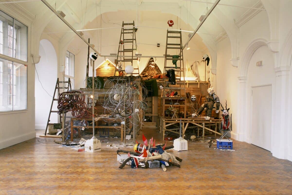 Mike Nelson, Studio Apparatus for Camden Arts Centre - An Introductory Structure: Introduction; A Lexicon of Phenomena & Information Association; Futurobjectics (In Three Sections); Mysterious Island* / *See Introduction / or TEMPORARY MONUMENT, 1998. Installation view, Camden Arts Centre, London, 1998. Photo credit: Mike Nelson. Courtesy the artist and 303 Gallery, New York; Galleria Franco Noero, Turin; Matt’s Gallery, London; and neugerriemschneider, Berlin.