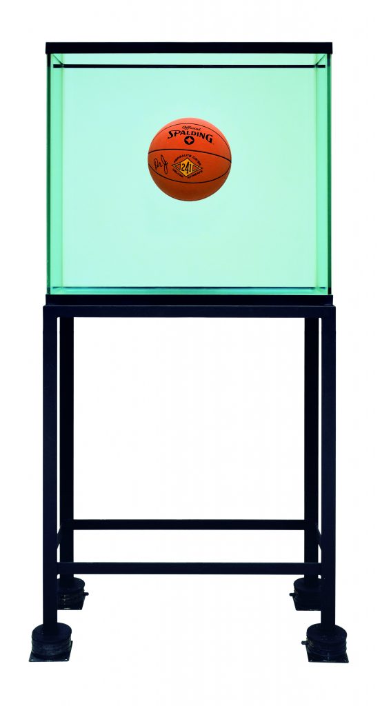 Jeff Koons (b. 1955)One Ball Total Equilibrium Tank (Spalding Dr. J 241 Series)glass, steel, sodium chloride reagent, distilled water, one basketball164.5 x 78.1 x 33.7 cm © Jeff KoonsEdition 2 of 21985