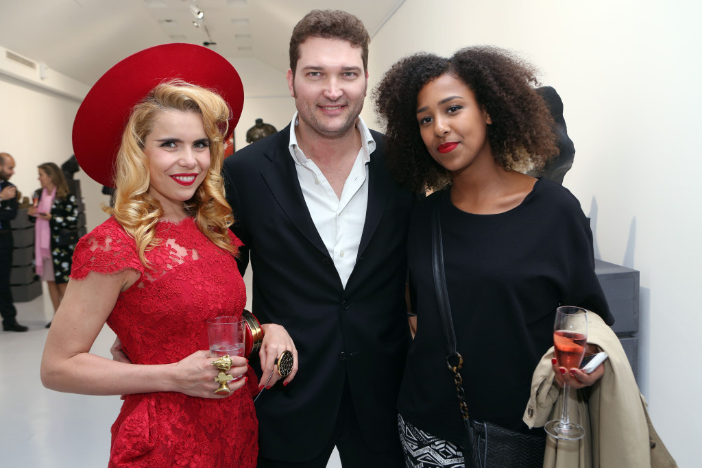Traces of Time exhibition by artist Igor Mitoraj at ContiniArtUK, London. Paloma Faith with gallery owner Cristian Contini.