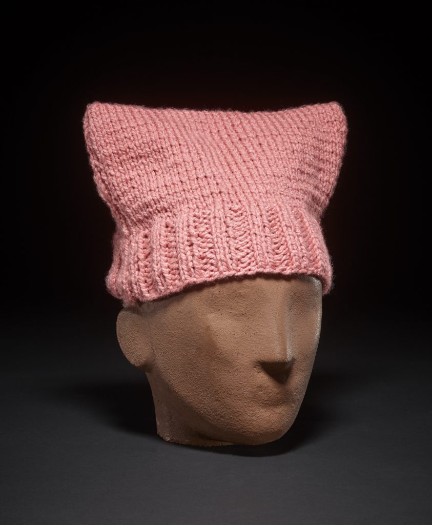 Pink Hat (Pussyhat), USA, 2017, knitted wool. © The Trustees of the British Museum 