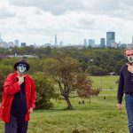 Ron Arad and Maurice Ostro was taken on Primrose Hill – and they are making the sign for ‘Smile’ in British Sign Language