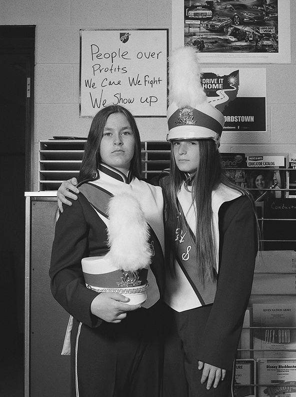 CAPTION: Cindy Higinbotham and Monet Hostutler, best friends and banner carriers, in the Lordstown High School band room, Lordstown OH PHOTOS: COURTESY OF LATOYA RUBY FRAZIER AND GAVIN BROWN’S ENTERPRISE NEW YORK/ROME