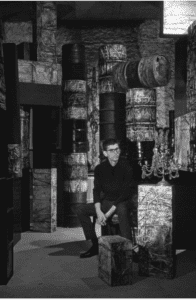 Paris, 1960: Christo in his storeroom in the basement of Jeanne-Claude’s apartment at 4, avenue Raymond Poincaré © Christo and Jeanne-Claude Foundation Photo: René Bertholo Courtesy Gagosian