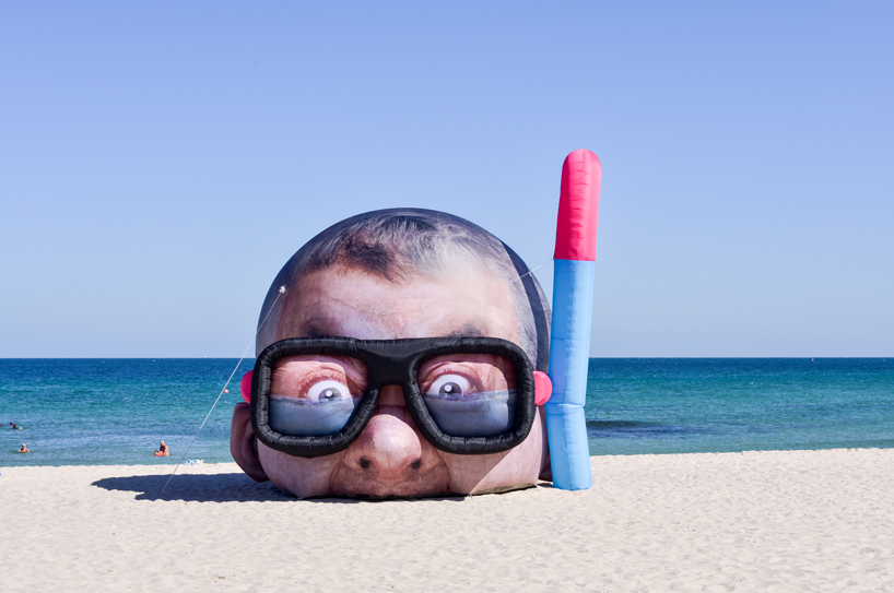 Inflated Damien Hirst head pops up on beach FAD MAGAZINE