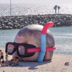 Inflated Damien Hirst head pops up on beach FAD MAGAZINE