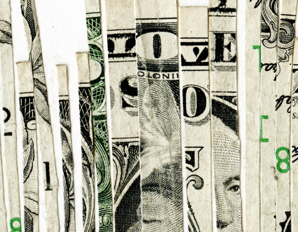 detail - 'Cash can't bring love' dollar bill on paper by Nicola Anthony