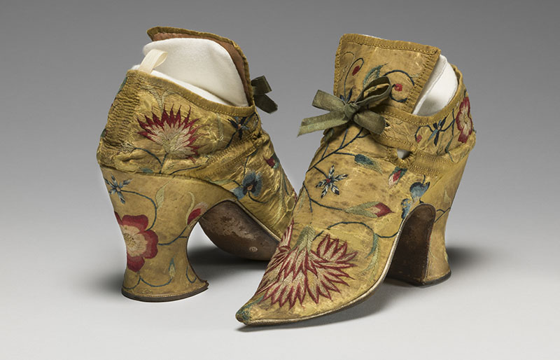 English silk shoes, bound with ribbon and embroidered