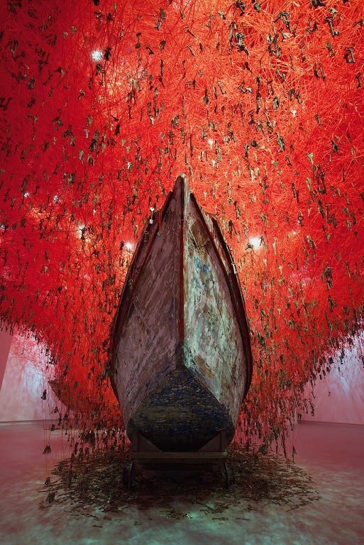 Chiharu Shiota, The Key in the Hand, 2015, old wooden boats, red wool, installation view: Japan Pavilion at 56th Venice Biennale, Venice, Italy, photo by Sunhi Mang, © VG Bild-Kunst, Bonn, 2020 and the artist