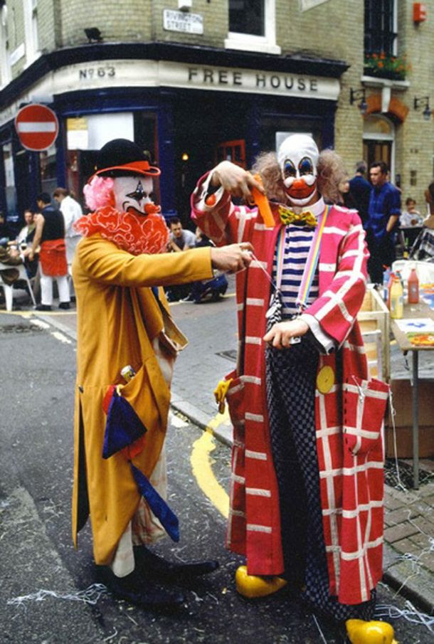 Damien Hirst and Angus Fairhurst dressed as clowns during 'A Fete Worse Than Death' 1993 photo: © Guy Moberly