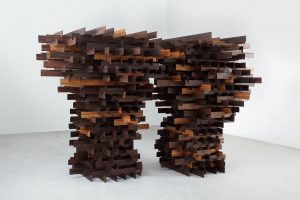 ALISON WILDING In a Dark Wood, 2012 Reclaimed laminated iroko and acrylic 210 x 370 x 217 cm