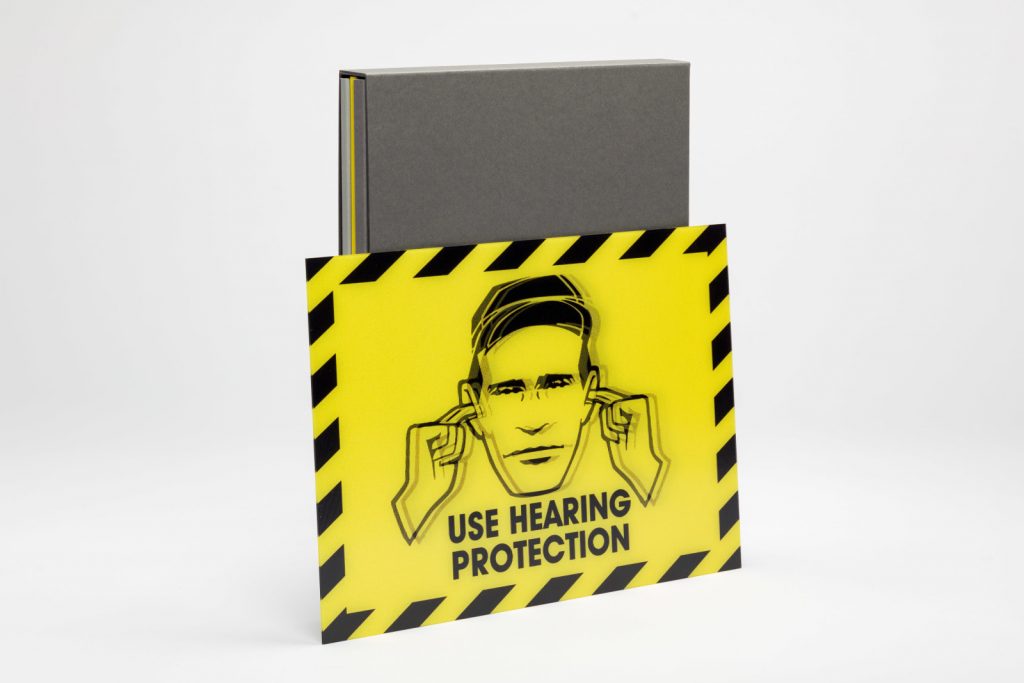 1 – 350 are accompanied by a limited edition lenticular print ‘Use Hearing Protection’, 2019. 26.8 x 18.4 cm. Presented in an envelope, signed and numbered by Peter Saville.