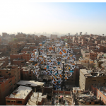 The Tunisian/French artist eL Seed’s installation Perception, was painted across 50 buildings in Cairo without the consent of the Government who have stopped street artists making work, and censure artists across many media. The installation was in an area called Manshiyat Nasr, where Coptic Christians live. They are called Zabaleen (the garbage people) but do not use this term themselves. They collect the city’s rubbish and recycle it, yet are discriminated against because of their work, and they are seen as dirty. The text eL Seed used is from Saint Athanasius of Alexandria, a 3 rd century Coptic Bishop and states: ‘?? ???? ??? ?? ???? ??? ?????? ??? ???? ?? ???? ?????’ (Anyone who wants to see the sunlight clearly needs to wipe his eye first). The anamorphic image took the artist and a team of workers over three weeks in install, and it could clearly be seen from the nearby Moqattam Mountain. Perception 2016 Installation, paint on 50 buildings