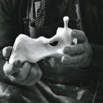 Moore holding the plaster maquette for Reclining Figure: Hand 1976, (LH 707) Photo: Henry Moore Archive